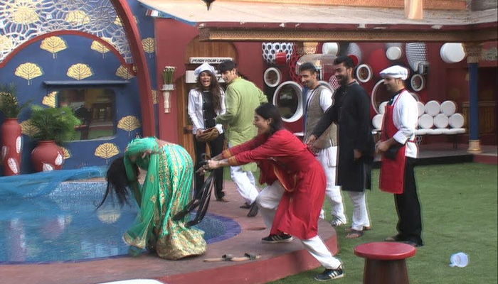 Bani pushes Lokesh into the pool