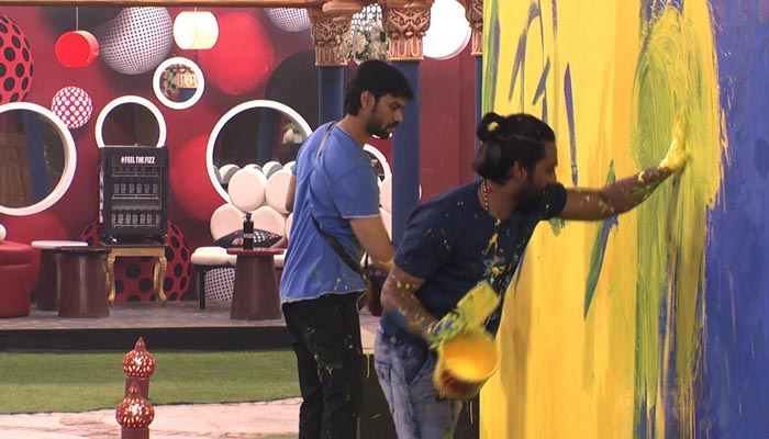 Gaurav, Manveer perform the painting task