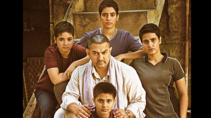 Aamir Khan with his onscreen daughters in Dangal