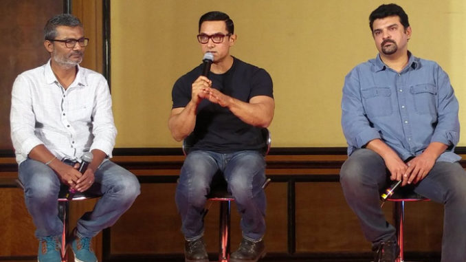 Nitish Tiwari, Aamir Khan, Sidharth Roy Kapur at the poster launch of 'Dangal'
