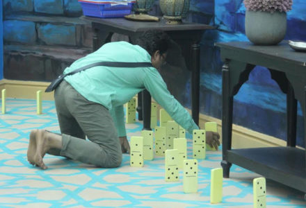 Navin places his set to dominos in the Bigg Boss house