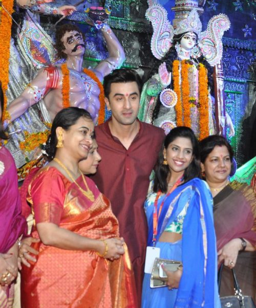 Ranbir Kapoor poses with the ladies at durga puja celebrations