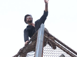 Shah Rukh Khan waves to his fans outside Mannat
