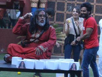 Om Swami parks himself on the table during the captaincy task