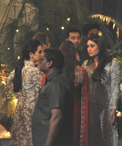 Karisma Kapoor, Kareena Kapoor Khan chatting with guests at the party