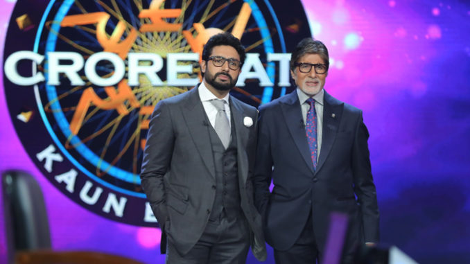 Abhishek Bachchan with Amitabh Bachchan on KBC 9