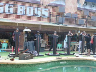 Contestants perform the luxury budget task