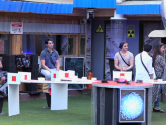 Contestants performing the luxury budget task