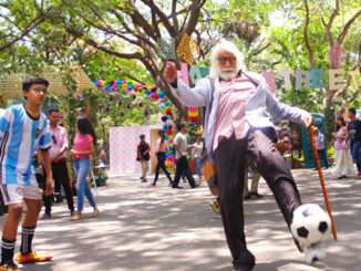 Amitabh Bachchan plays football with kids